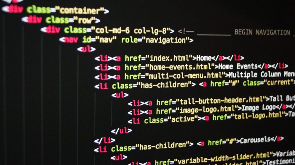 pexels photo 270404 Close-up of vibrant HTML code displayed on a computer screen, showcasing web development and programming.